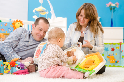 TOYS ARE PROPERTY RELEASED!!! Happy family playing together: mother, father and 1 year old baby girl sitting on floor at children's room, smiling. [url=my_lightbox_contents.php?lightboxID=3353131][img]http://www.nitorphoto.com/istocklightbox/babytoys.jpg[/img][/url] [url=my_lightbox_contents.php?lightboxID=2443639][img]http://www.nitorphoto.com/istocklightbox/childhood.jpg[/img][/url] [url=my_lightbox_contents.php?lightboxID=1500858][img]http://www.nitorphoto.com/istocklightbox/babyandmother.jpg[/img][/url] [url=my_lightbox_contents.php?lightboxID=1507925][img]http://www.nitorphoto.com/istocklightbox/peopleathome.jpg[/img][/url]